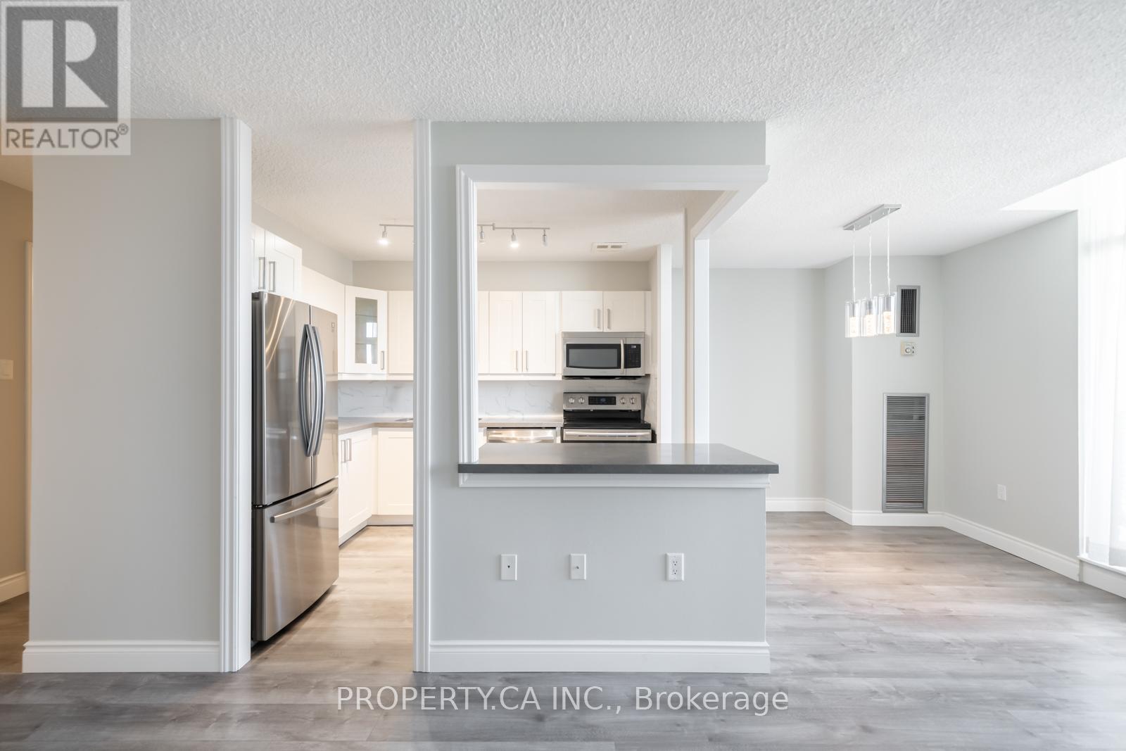 #1204 355 RATHBURN ROAD E - 2