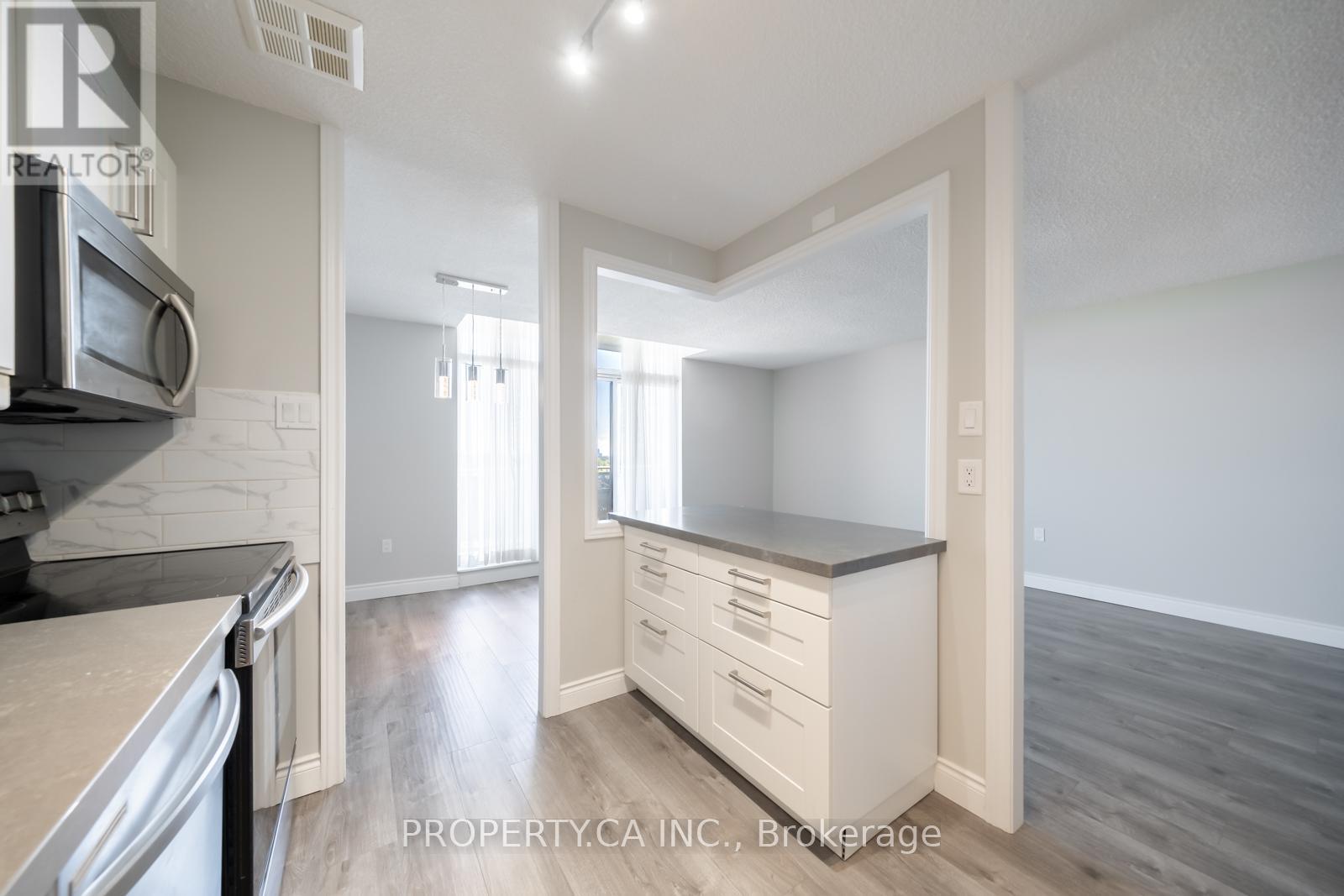 #1204 355 RATHBURN ROAD E - 8