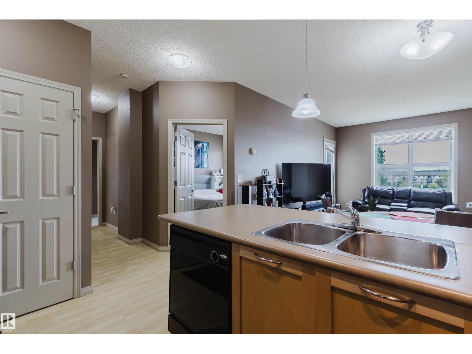 #1-405 4245 139 AV NW - 8