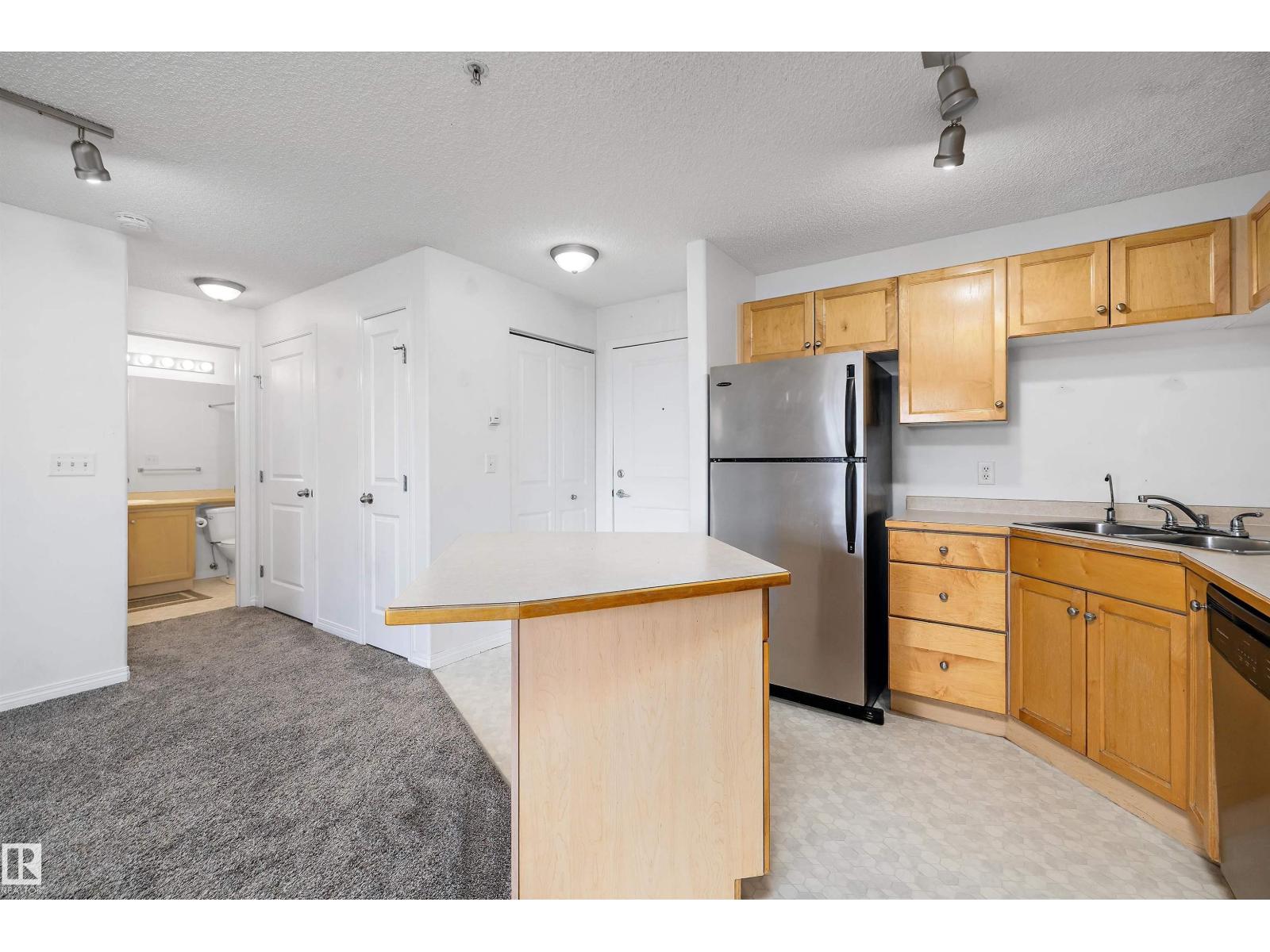 #320 245 EDWARDS DR SW — photo 10