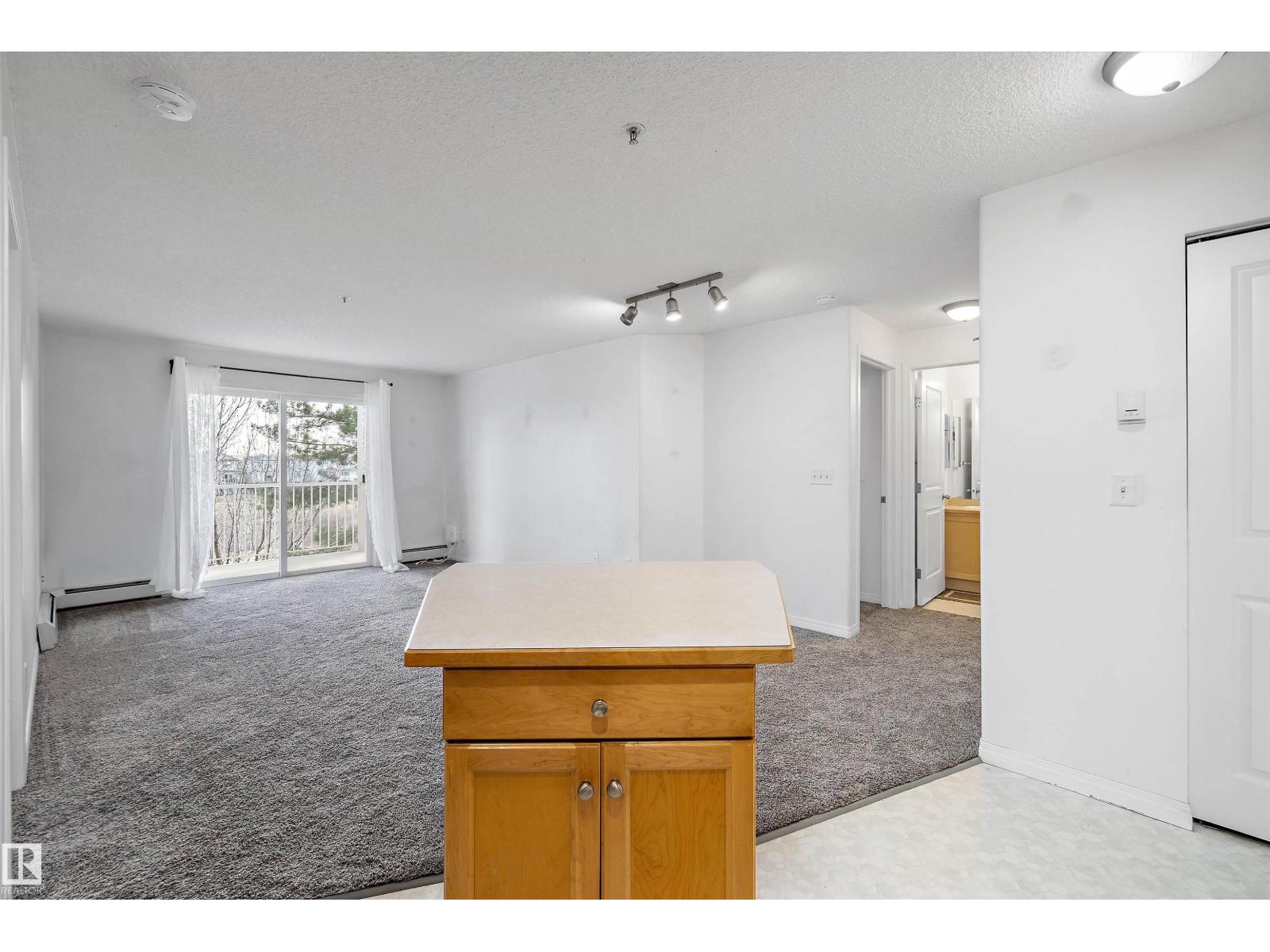 #320 245 EDWARDS DR SW — photo 12