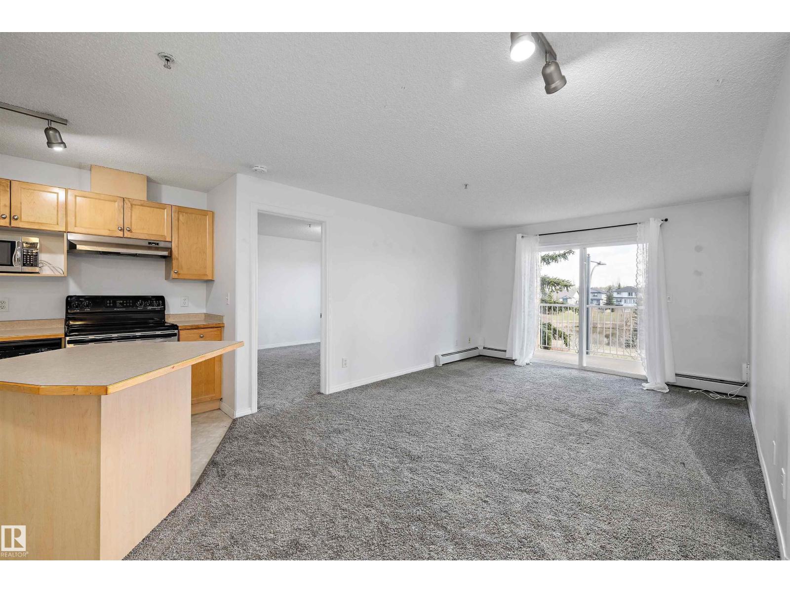 #320 245 EDWARDS DR SW — photo 14