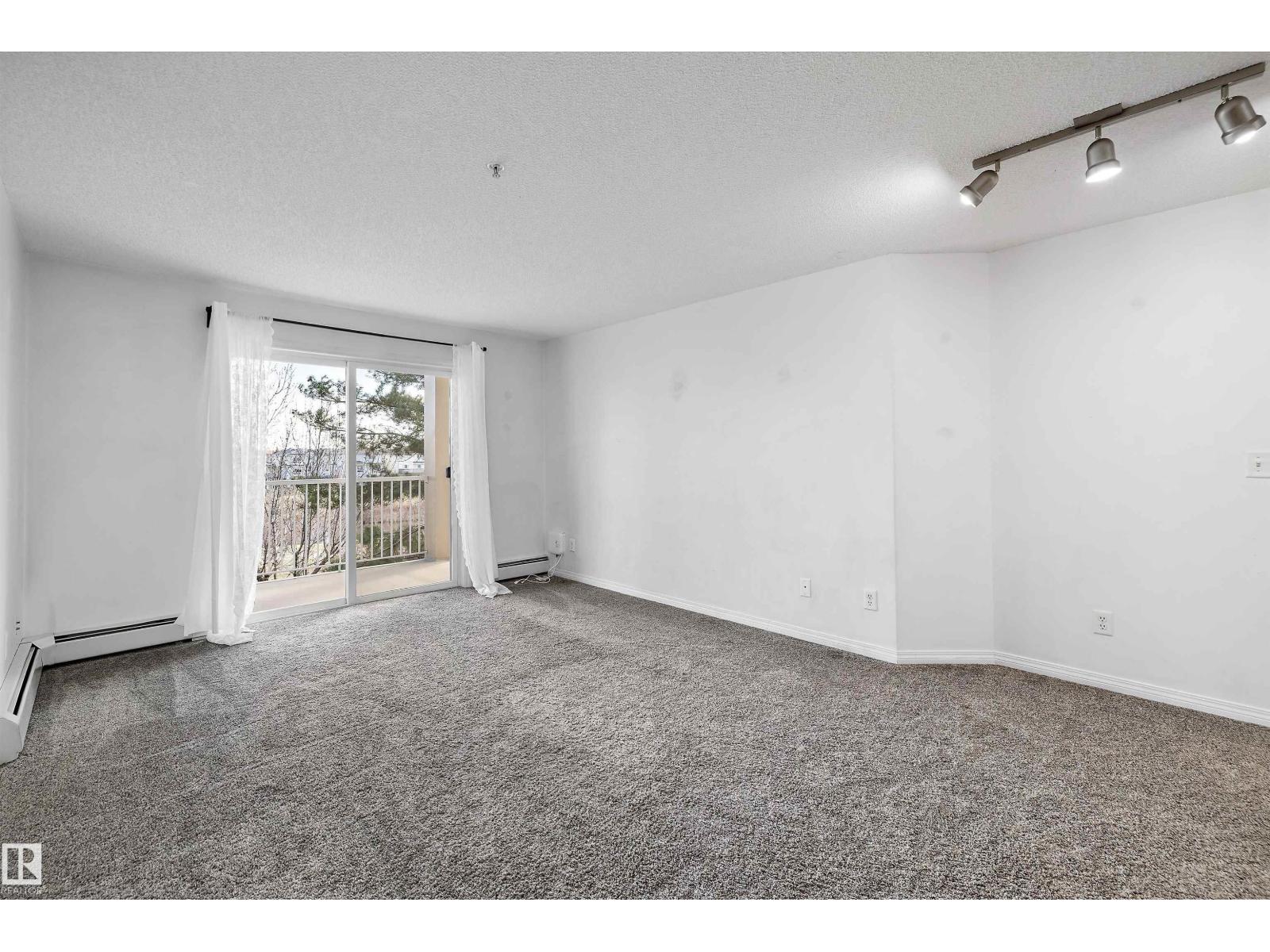#320 245 EDWARDS DR SW — photo 16