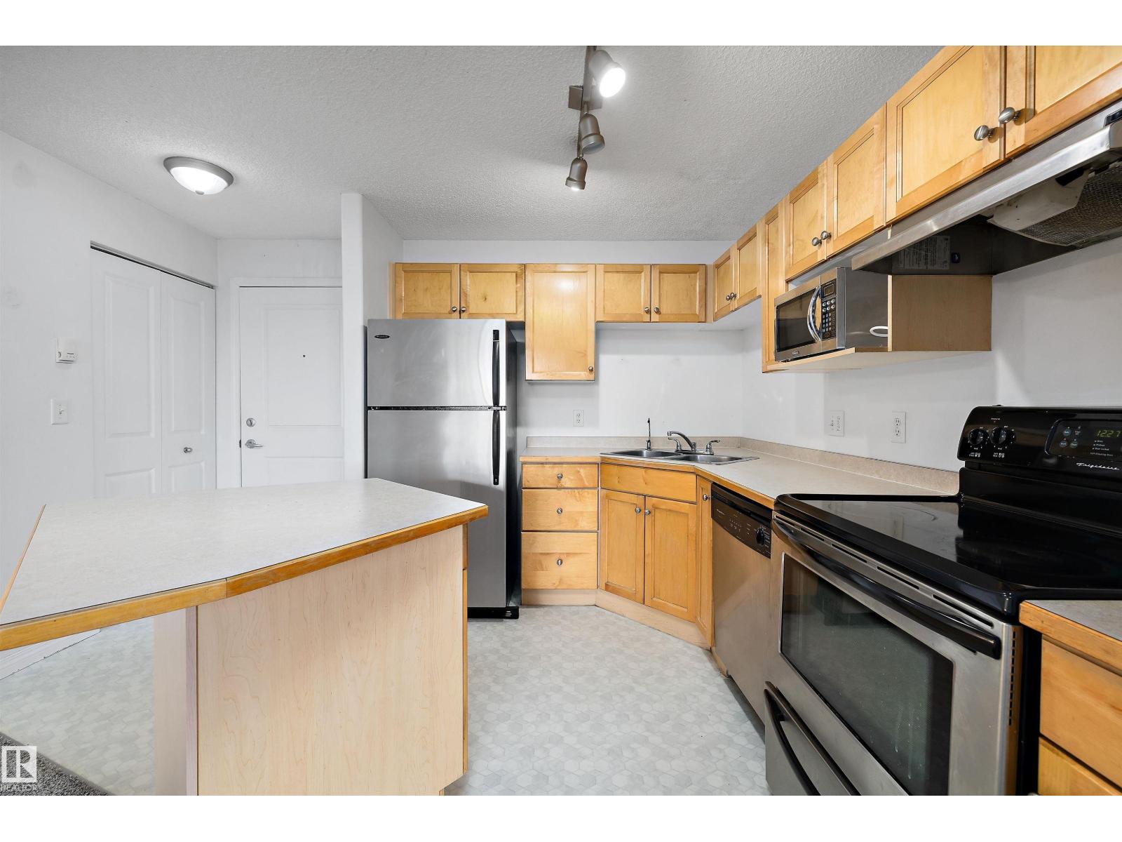 #320 245 EDWARDS DR SW — photo 9