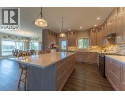 Laundry room - 4898 Telqua Drive, 108 Mile Ranch, BC V0K2Z0 Photo 12