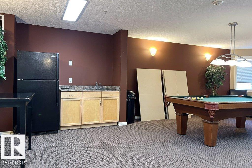 #303 5951 165 AV NW - 23
