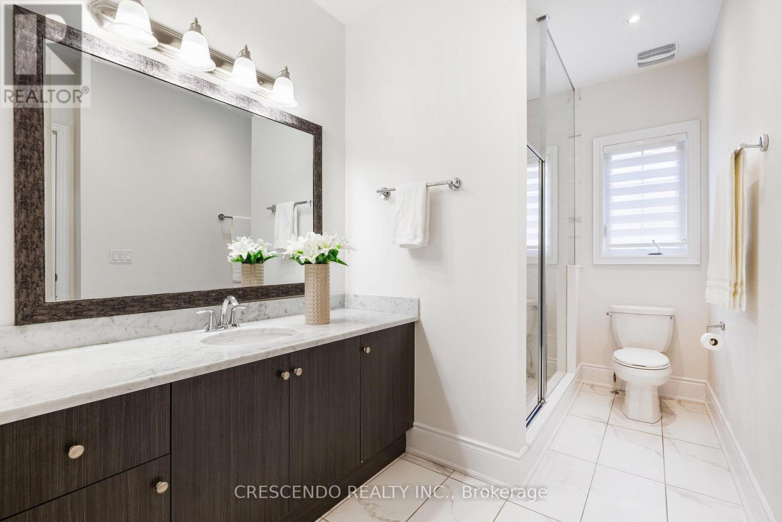 171 WOODGATE PINES DRIVE - 24