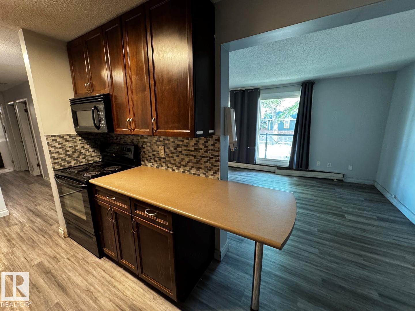 #203 10415 93 ST NW - 6