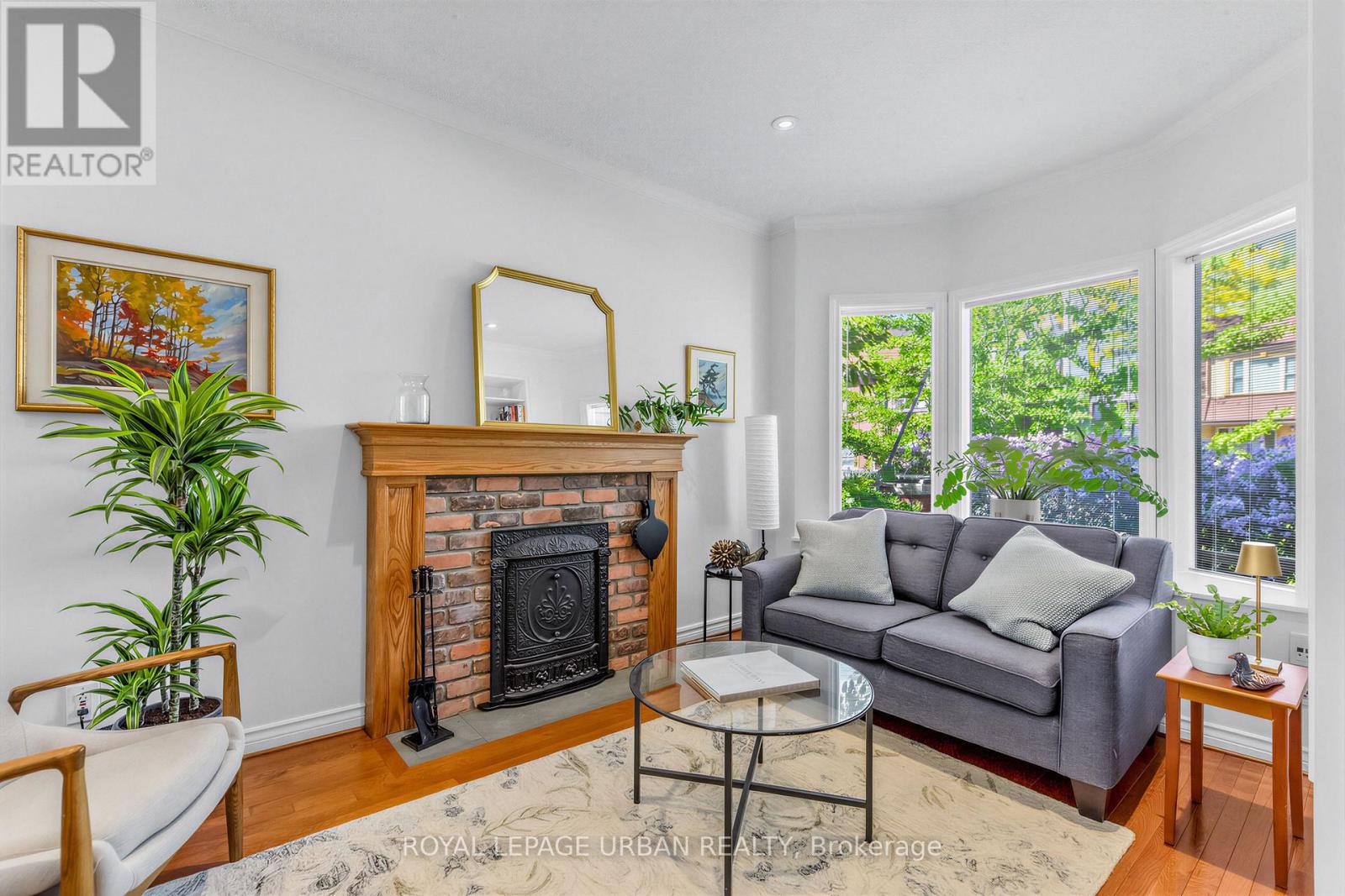 Living room with wood burning fireplace