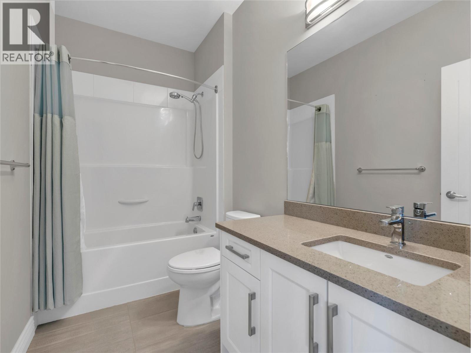 10511 QUINPOOL Road Unit# 103, Summerland
