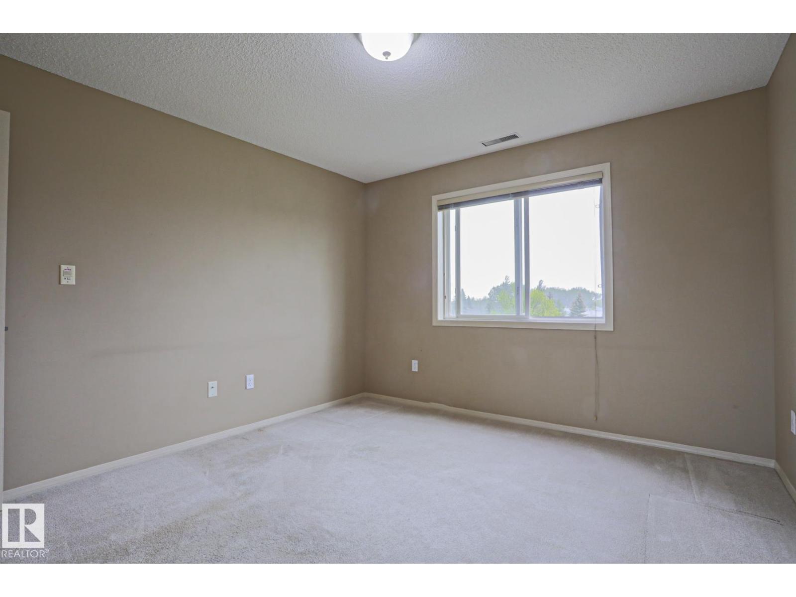 #216 279 SUDER GREENS DR NW — photo 31