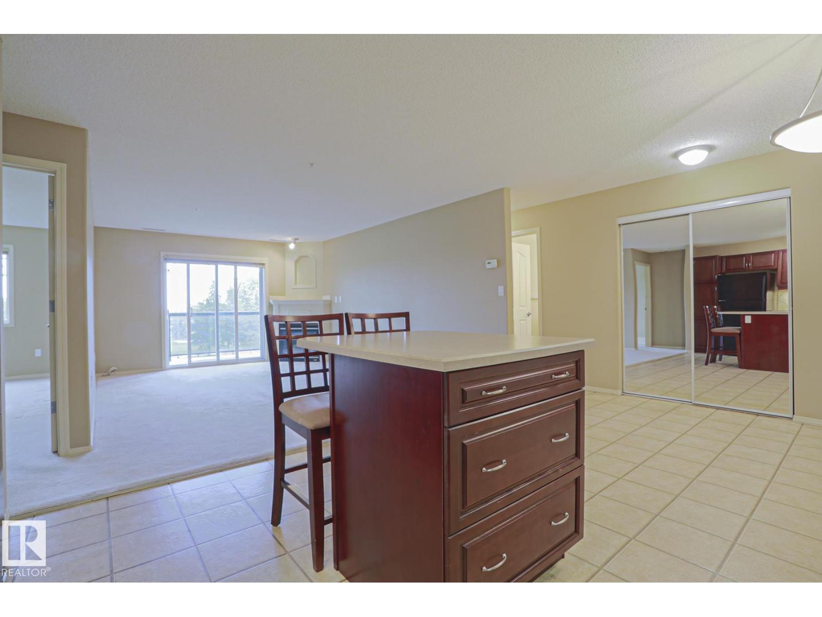 #216 279 SUDER GREENS DR NW — photo 7