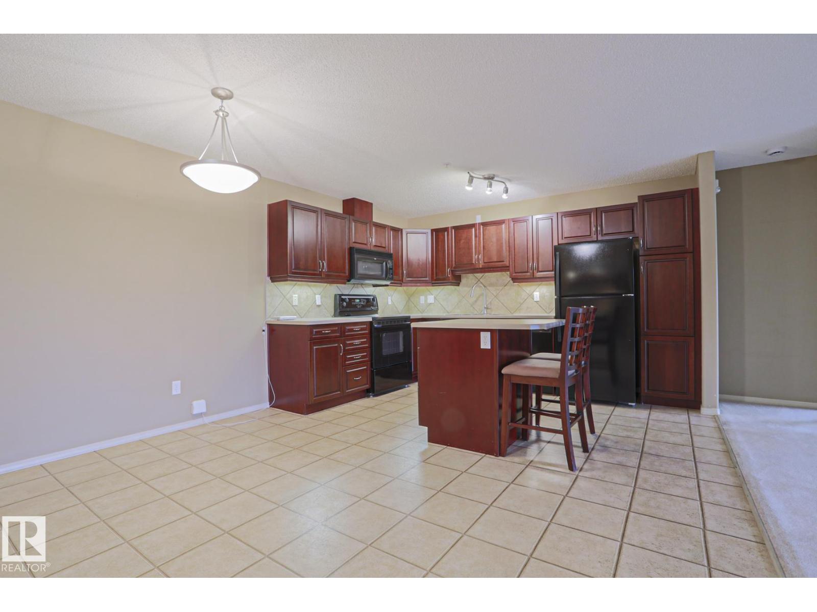 #216 279 SUDER GREENS DR NW — photo 8