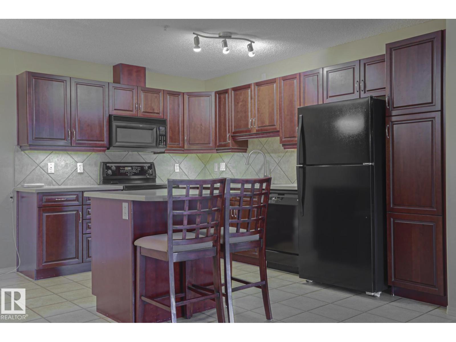 #216 279 SUDER GREENS DR NW — photo 9