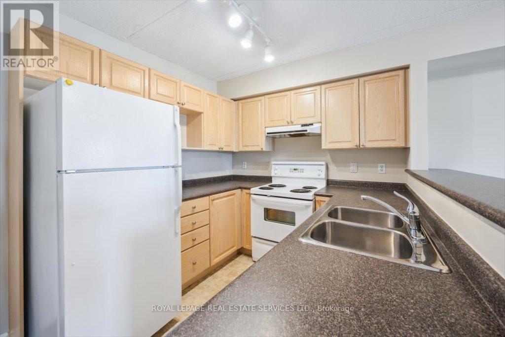 Kitchen Features a Raised Breakfast Bar