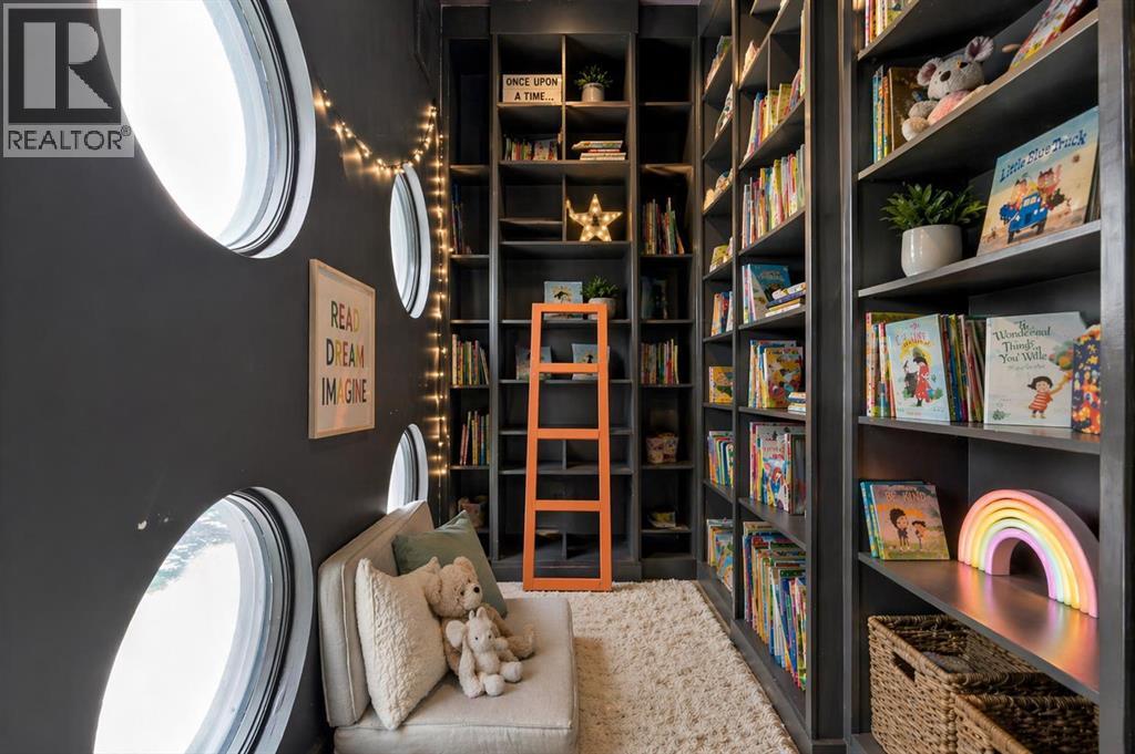 Upper level library/reading nook. This image has been digitally staged/altered