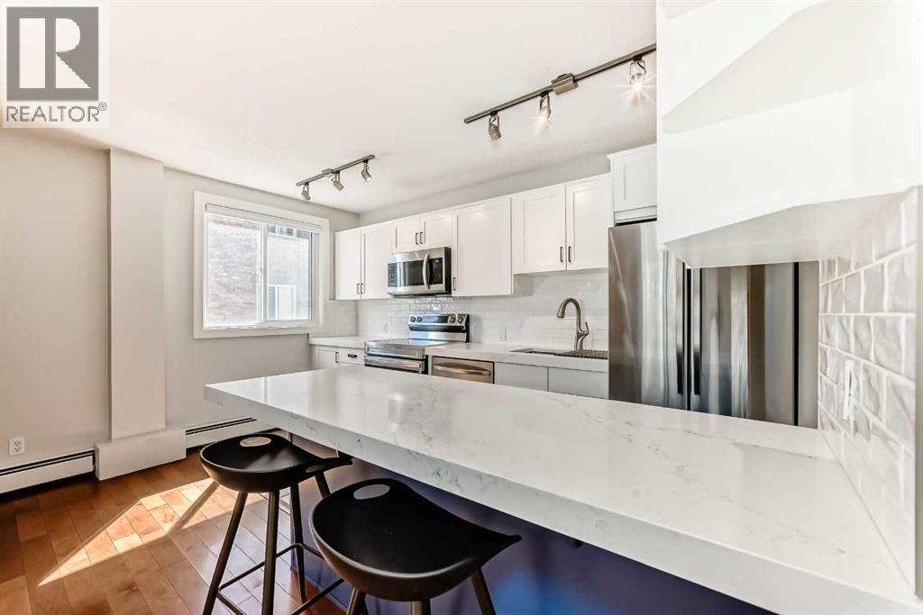 #303 835 18 Avenue SW - 1