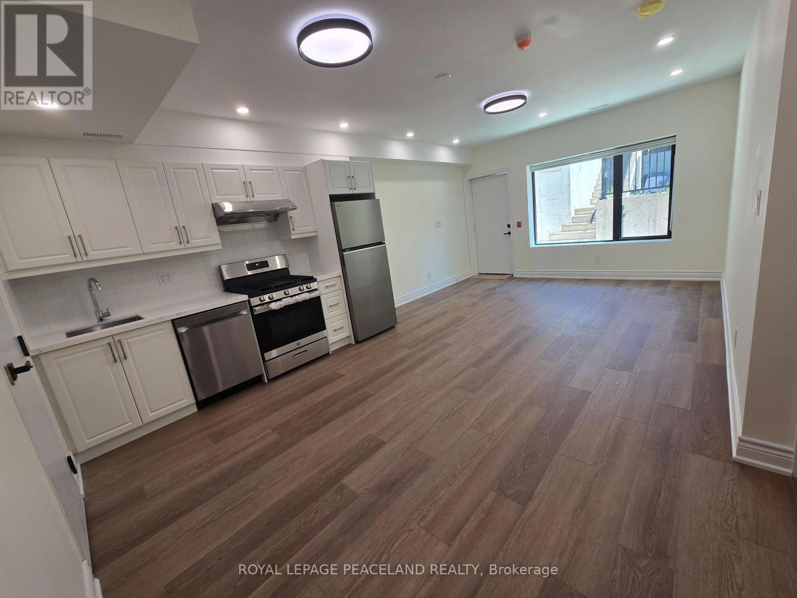 Listing photo of LANEWAY HSE LWR - 558 SPADINA CRESCENT