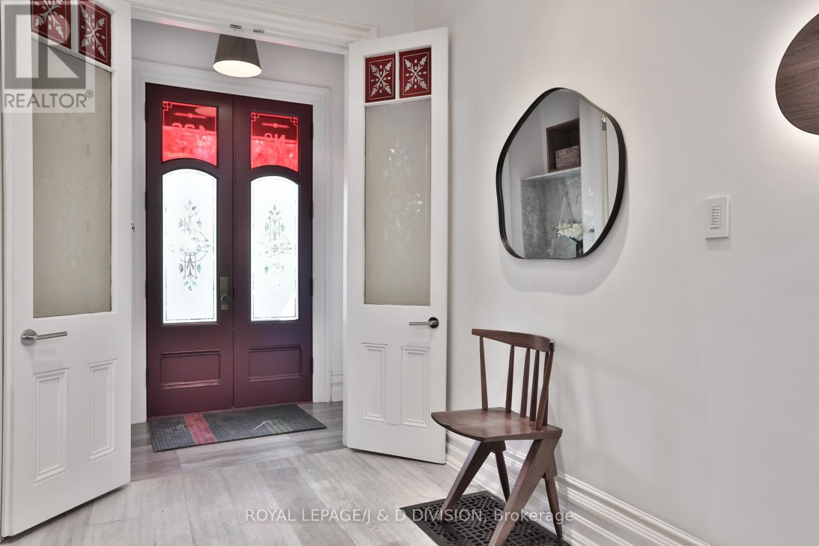 Period foyer with etched stained glass
