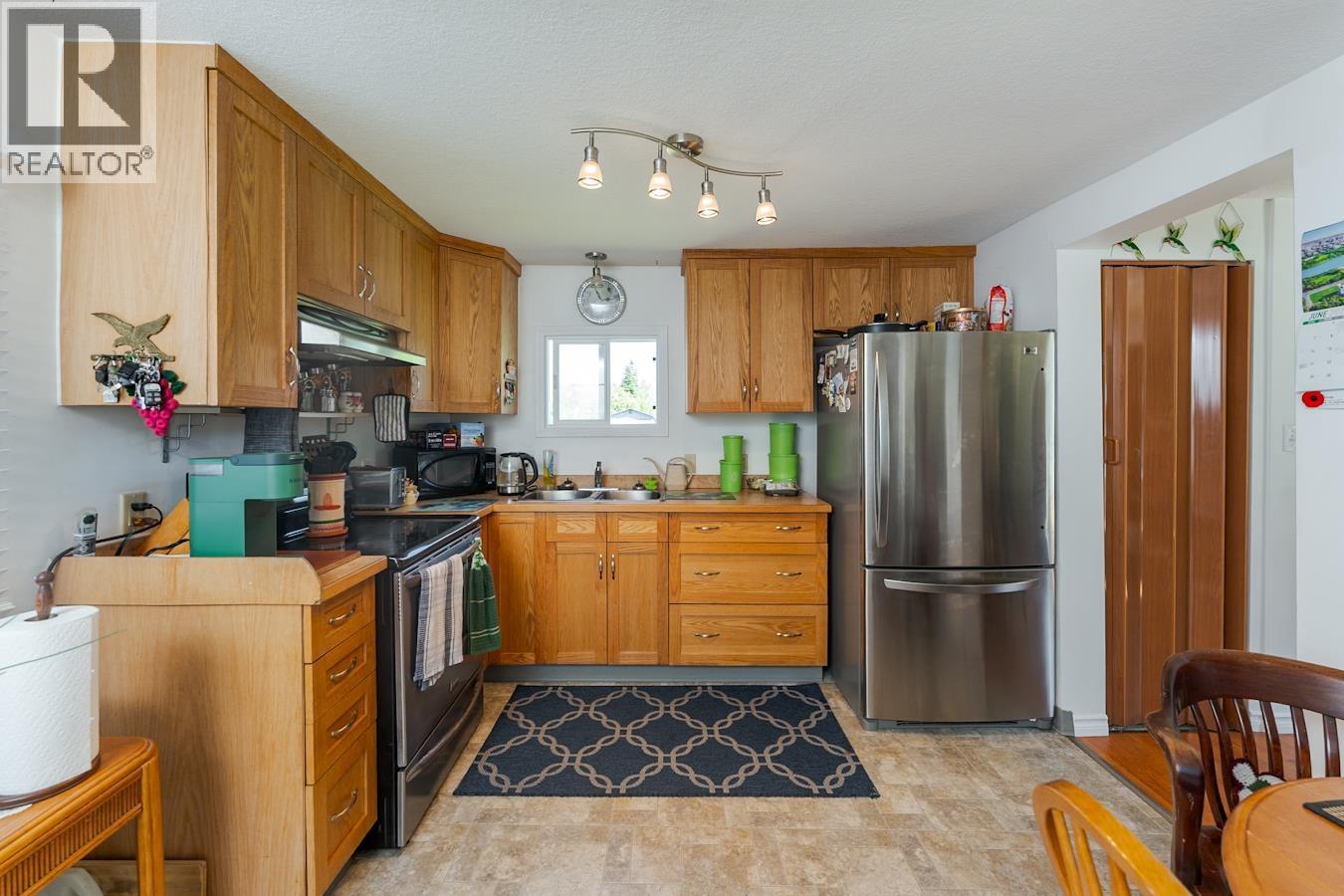 Primary bedroom of 6815 LANGER CRESCENT · Prince George, BC