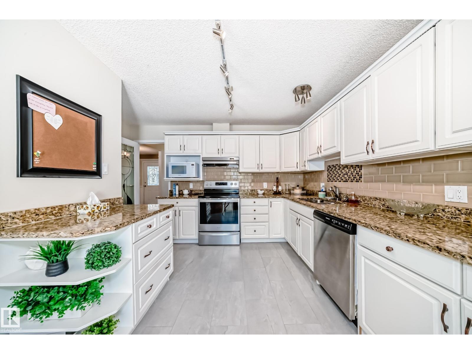 #50 303 TWIN BROOKS DR NW NW - 13