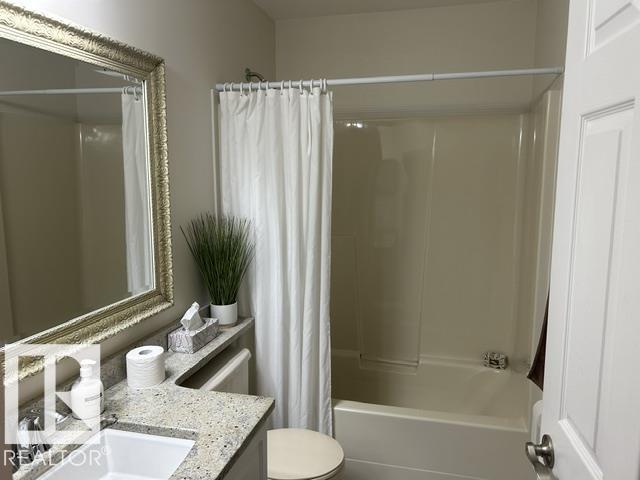 #50 303 TWIN BROOKS DR NW NW - 14