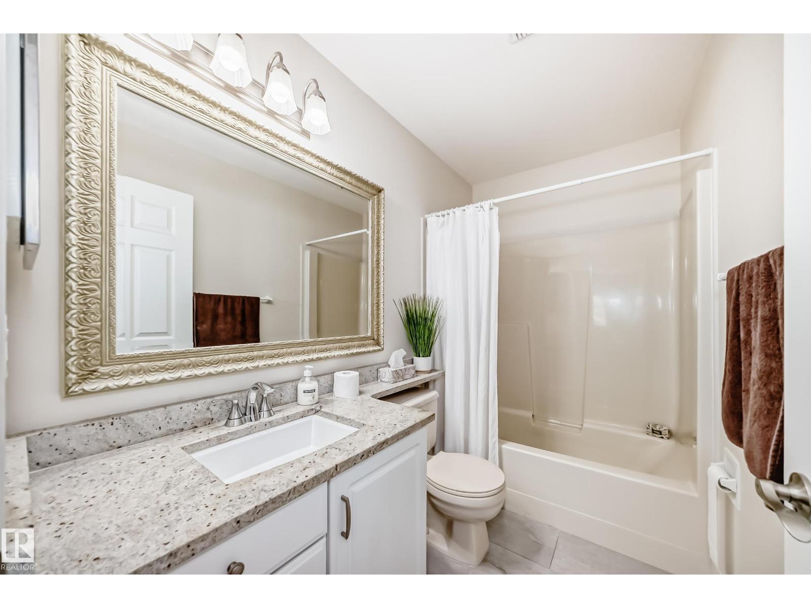 #50 303 TWIN BROOKS DR NW NW - 26