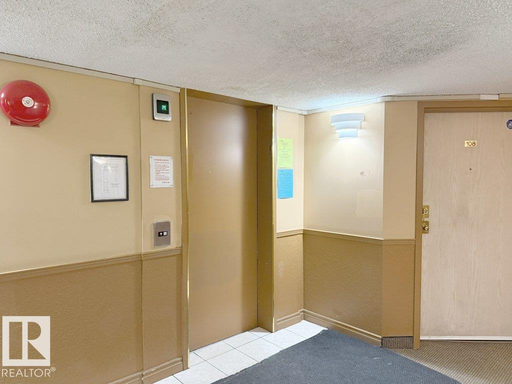 #218 5065 31 AV NW — photo 18