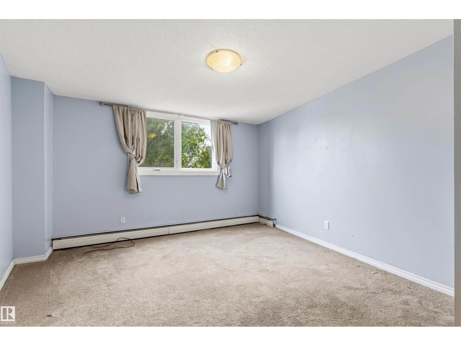 #303 10045 117 ST NW - 35