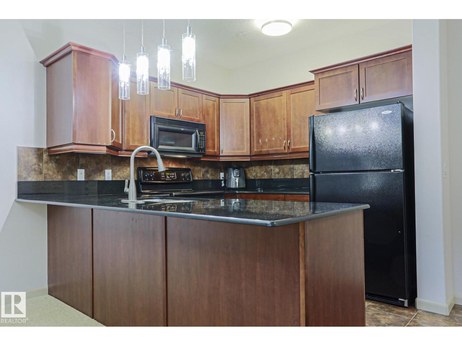 #117 160 MAGRATH RD NW - 3