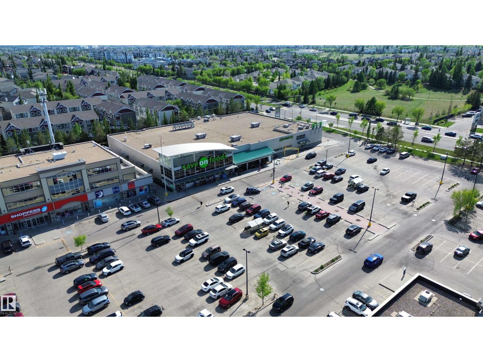 #117 160 MAGRATH RD NW - 32