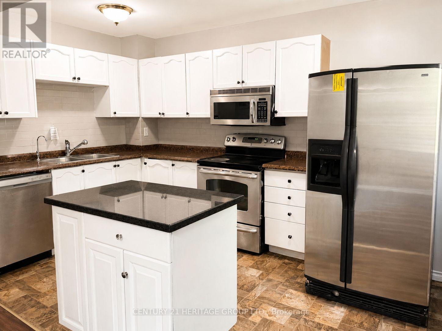 #7 441 BARRIE ROAD - 8