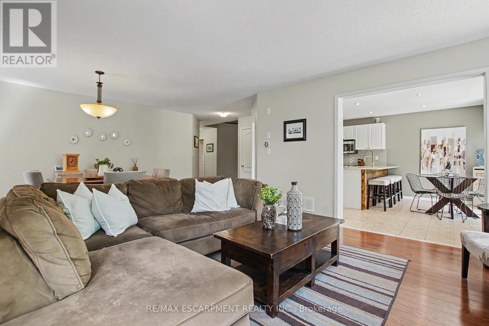 Living room opens to kitchen