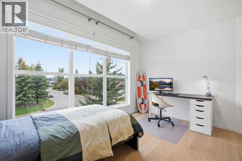 114 Cougarstone Crescent SW - 27