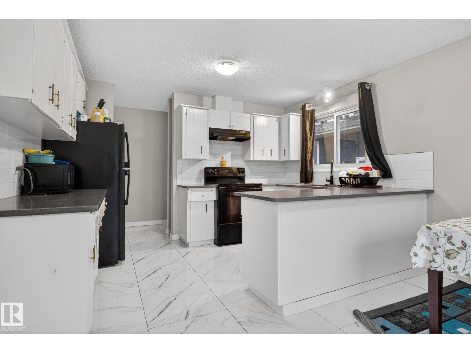 14332 121 ST NW - 10