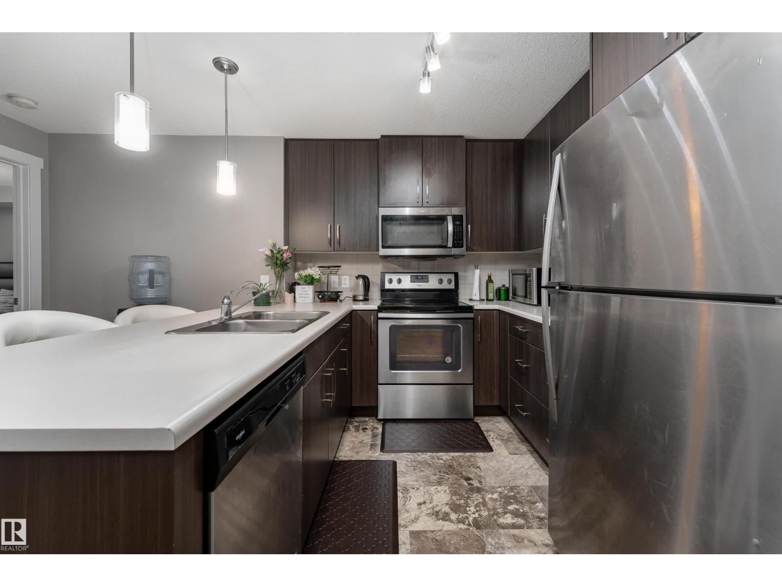 #115 3670 139 AV NW - 3