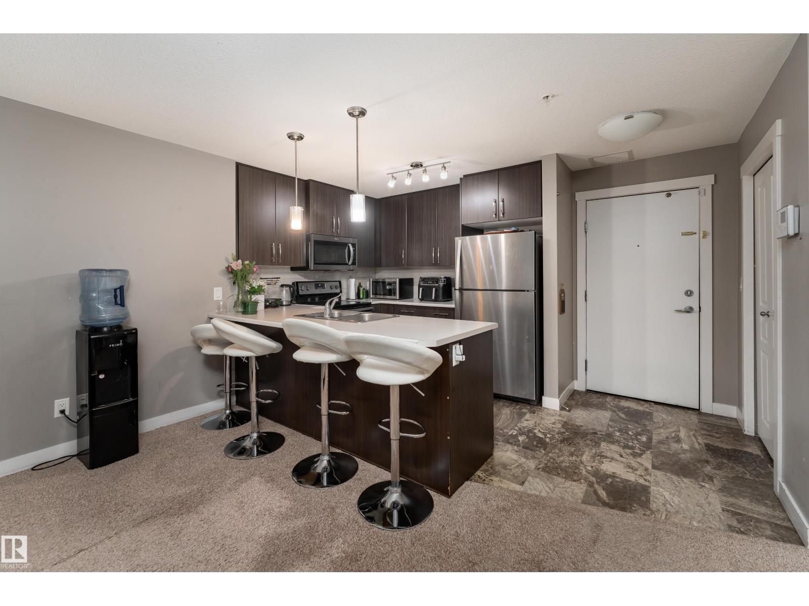 #115 3670 139 AV NW - 4