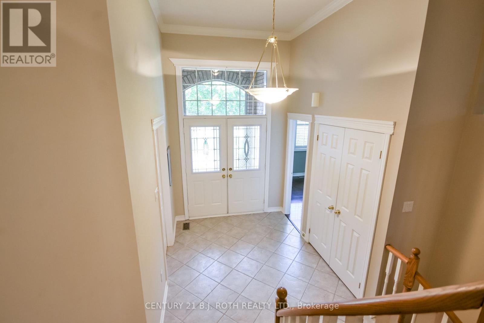 Foyer w/ home office, laundry room + garage access