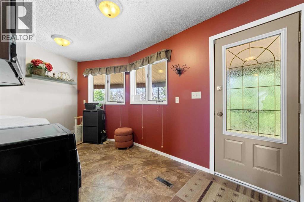 Back door - ground level with clothesline access