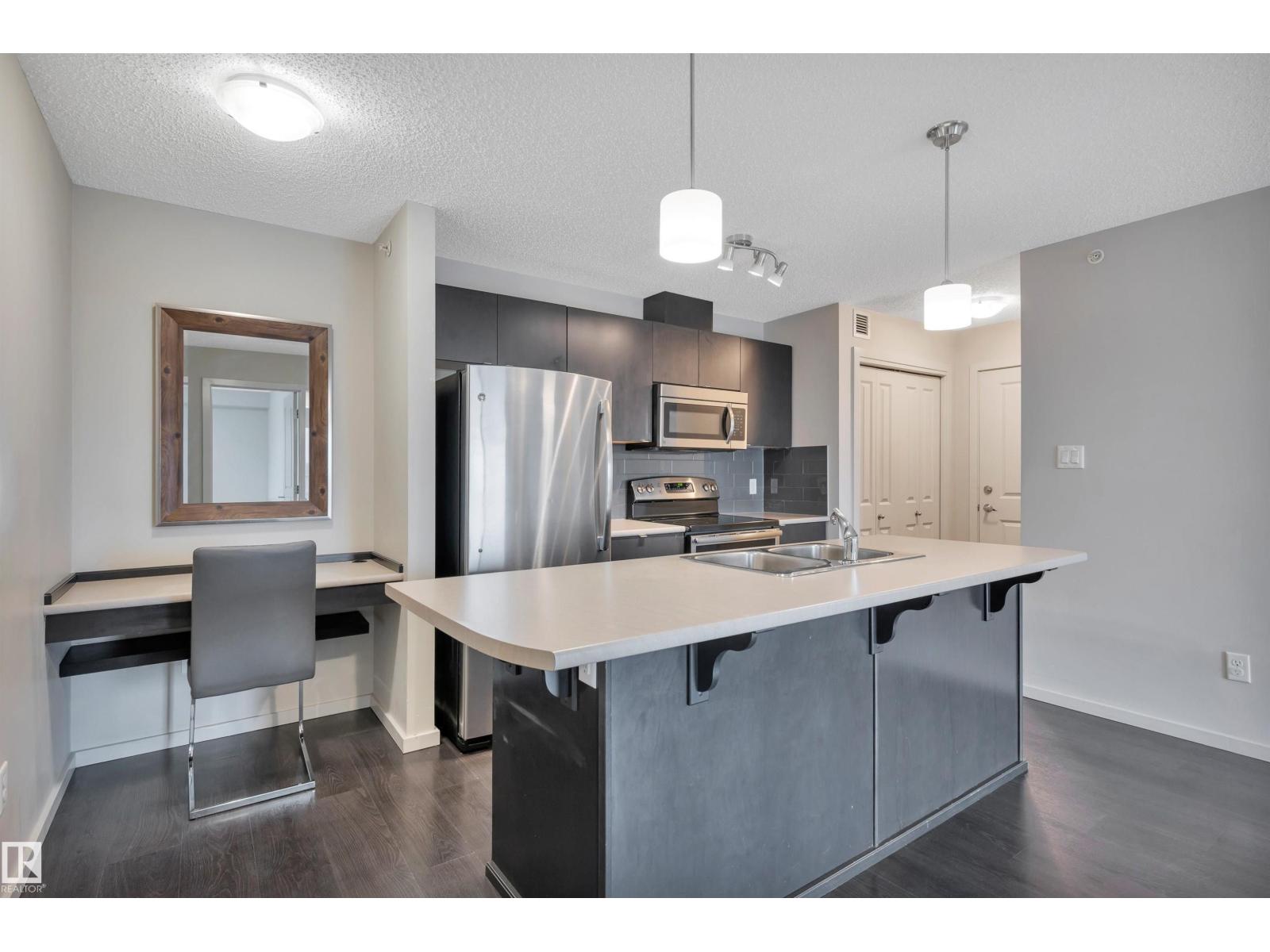 #447 348 WINDERMERE RD NW - 1