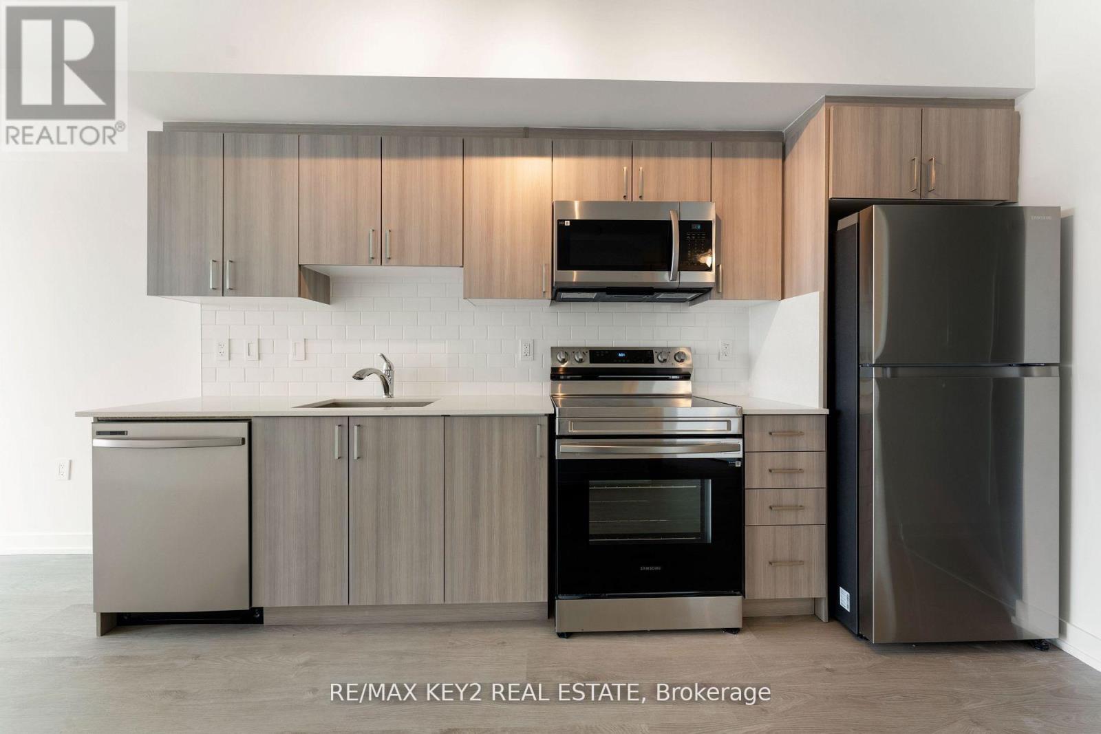 Open Kitchen With B/I Appliances
