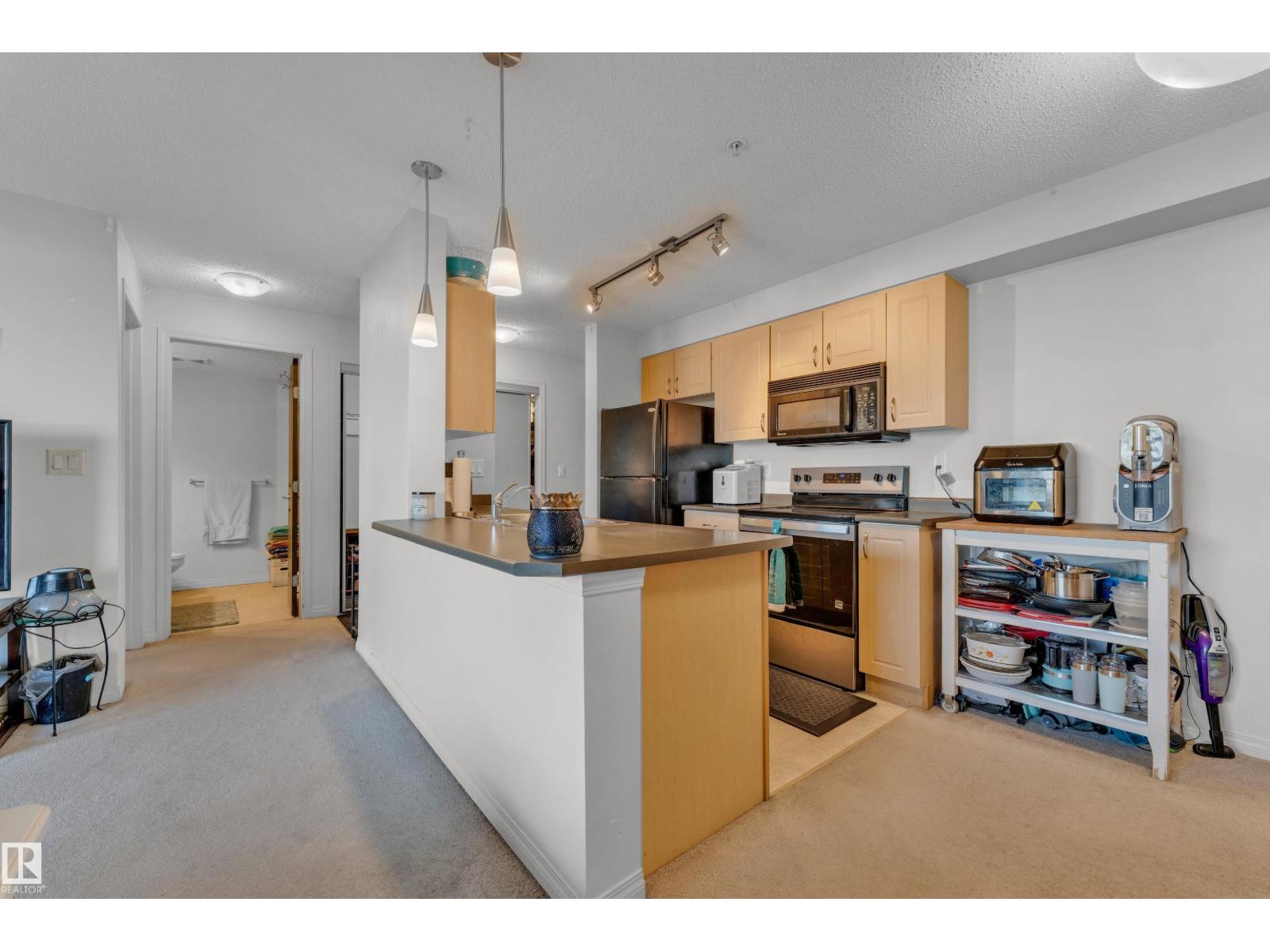 #305 13907 136 ST NW - 27