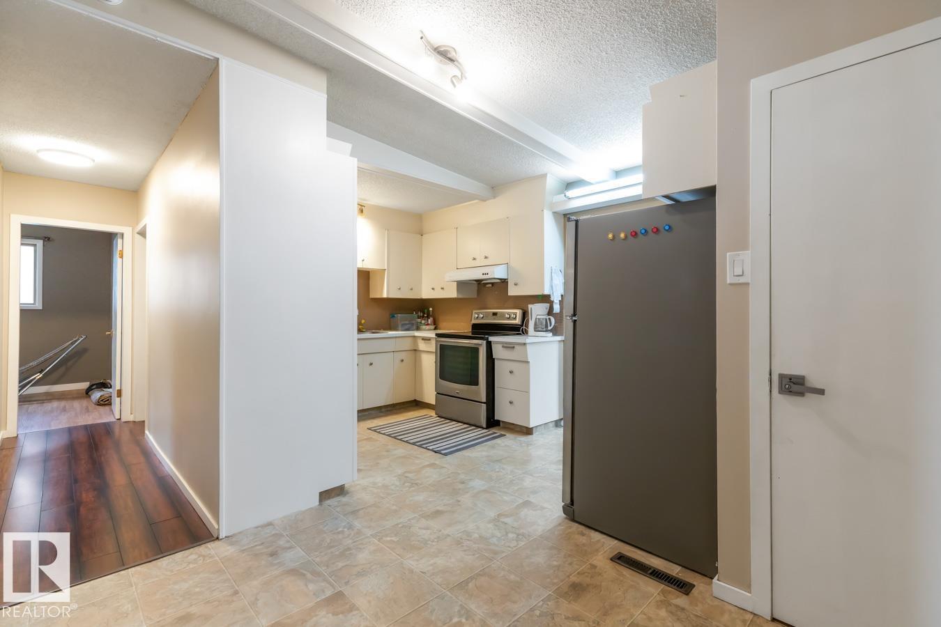 6303 89 AV NW - 9
