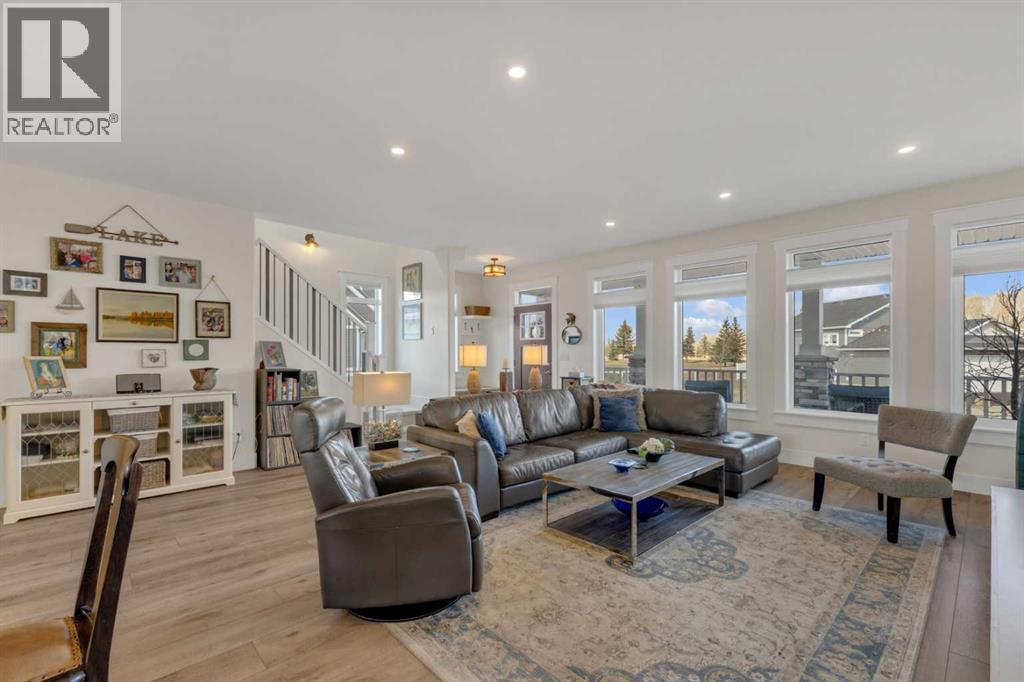 Large window bring in natural light, keeping the main living area connected to the outdoors