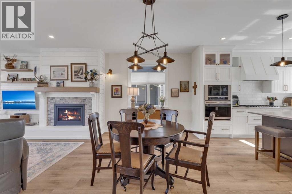 Positioned between kitchen and living areas, the dining space makes everyday meals and hosting feel easy