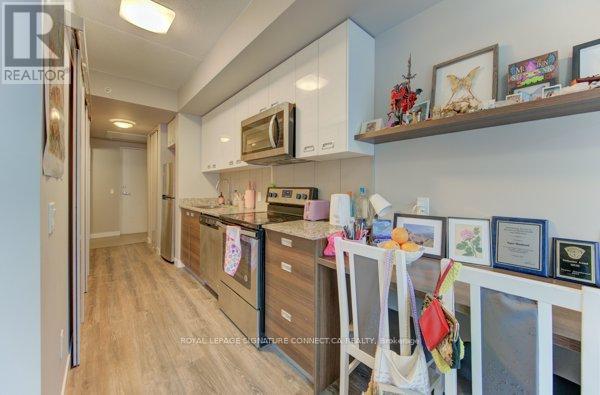 #203 250 ALBERT STREET - 21