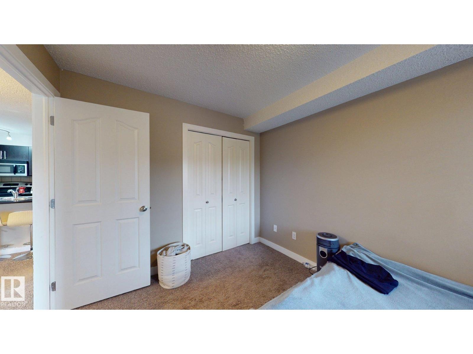 #207 11816 22 AV SW - 11