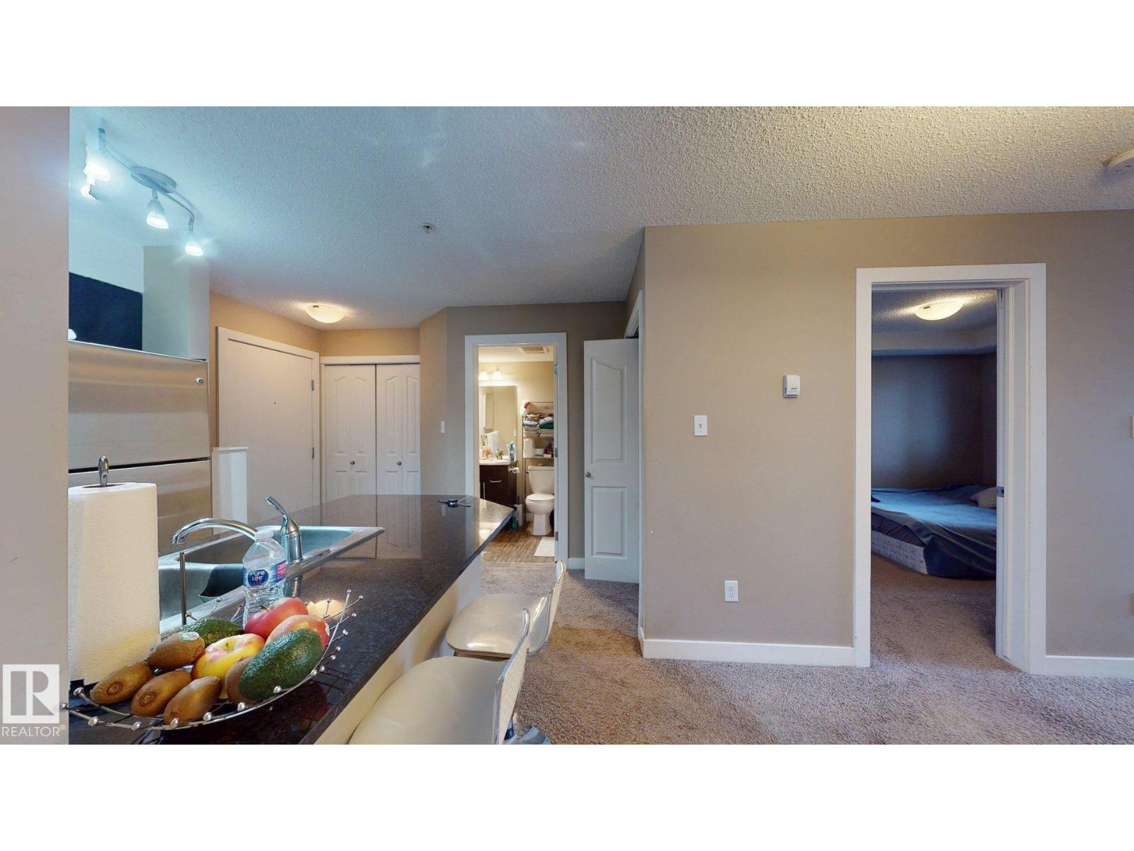 #207 11816 22 AV SW - 12