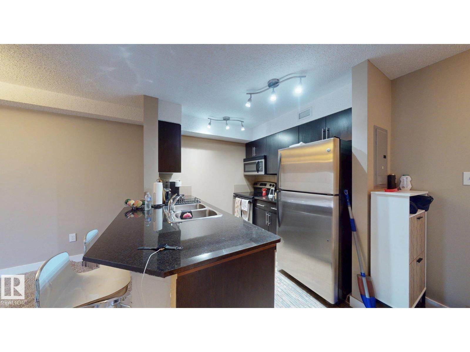 #207 11816 22 AV SW - 17