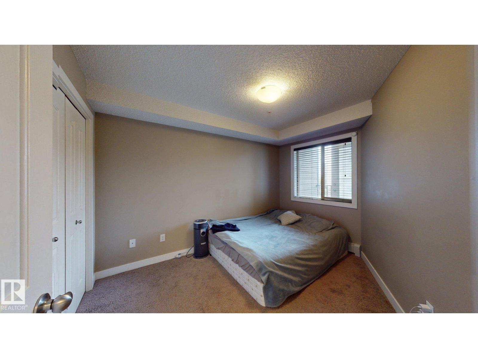 #207 11816 22 AV SW - 9